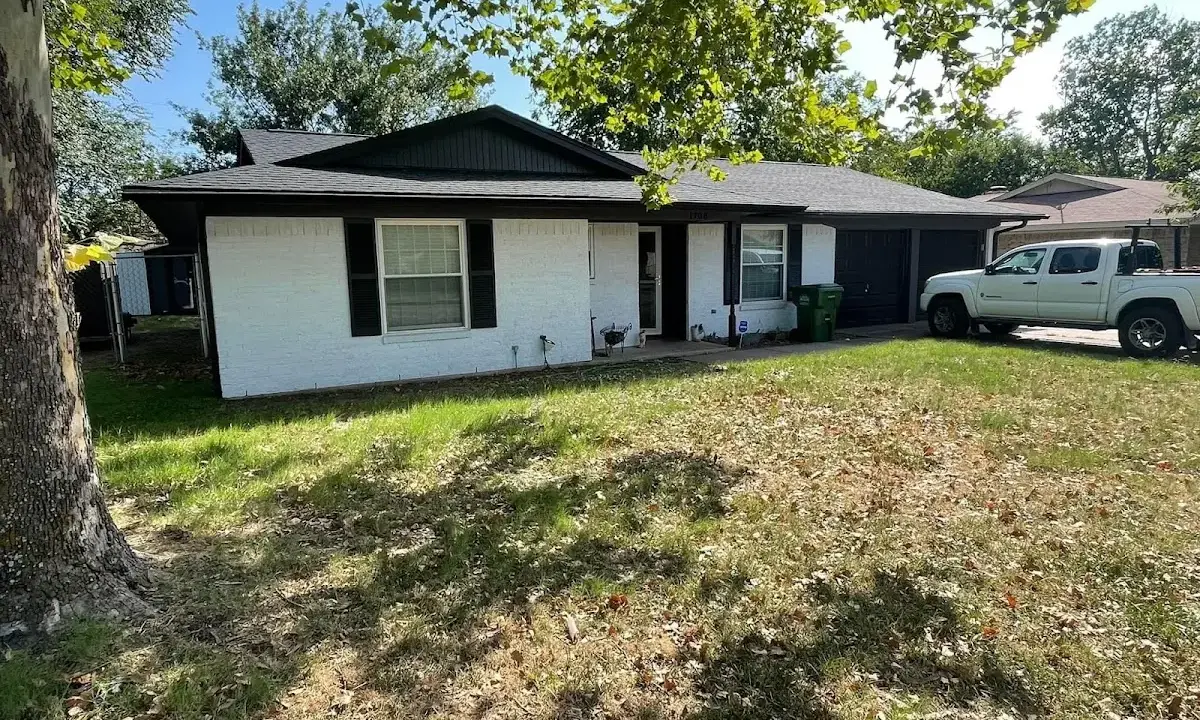 Professional roofing crew working on a residential roof in Santa Paula